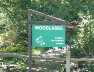 Woodlarks sign on Tilford Road Northbound